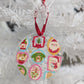 Decorative Christmas ornament with christmas themed designs 